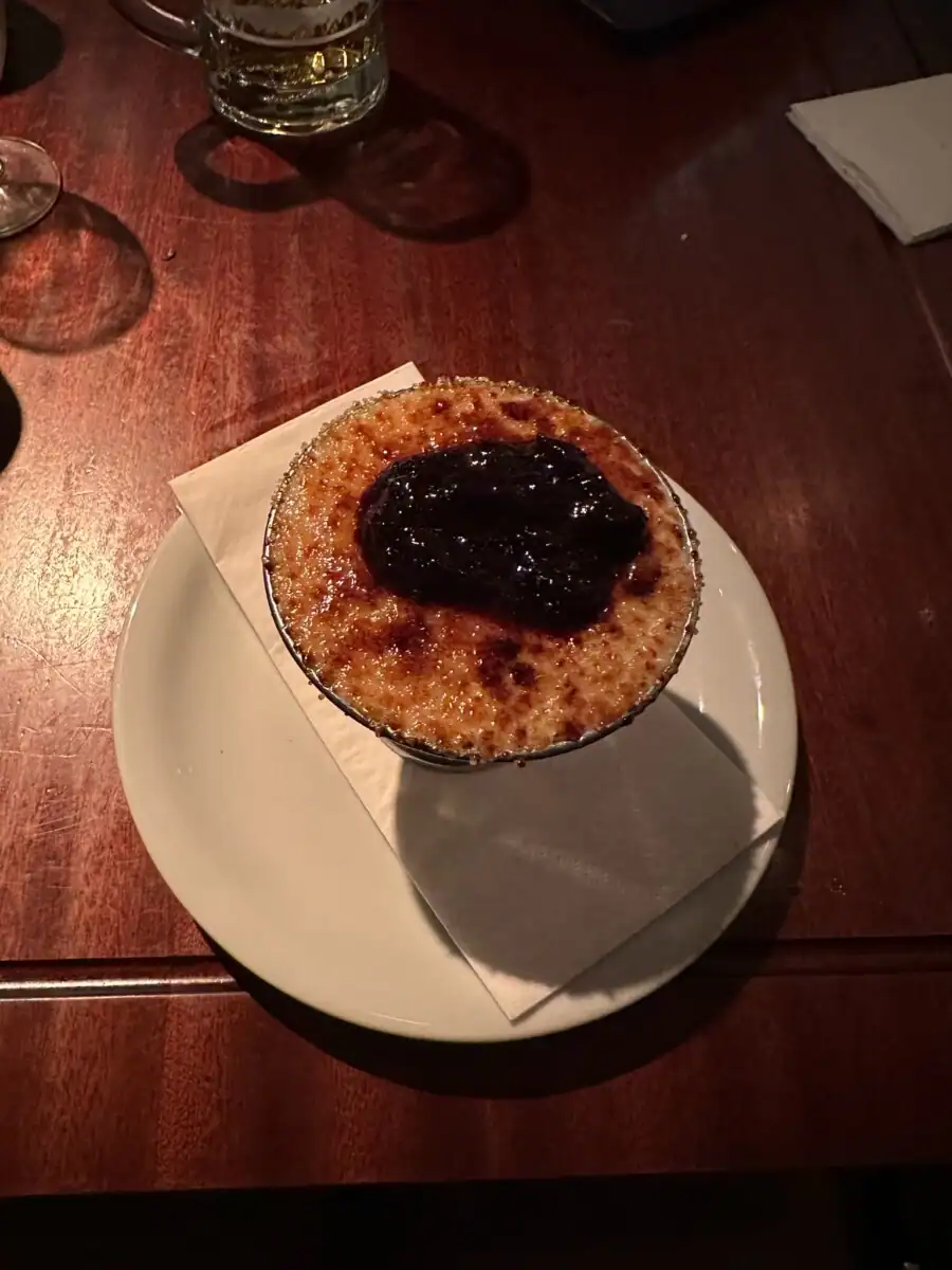 kheer from dishoom in london with blueberry compote on top.