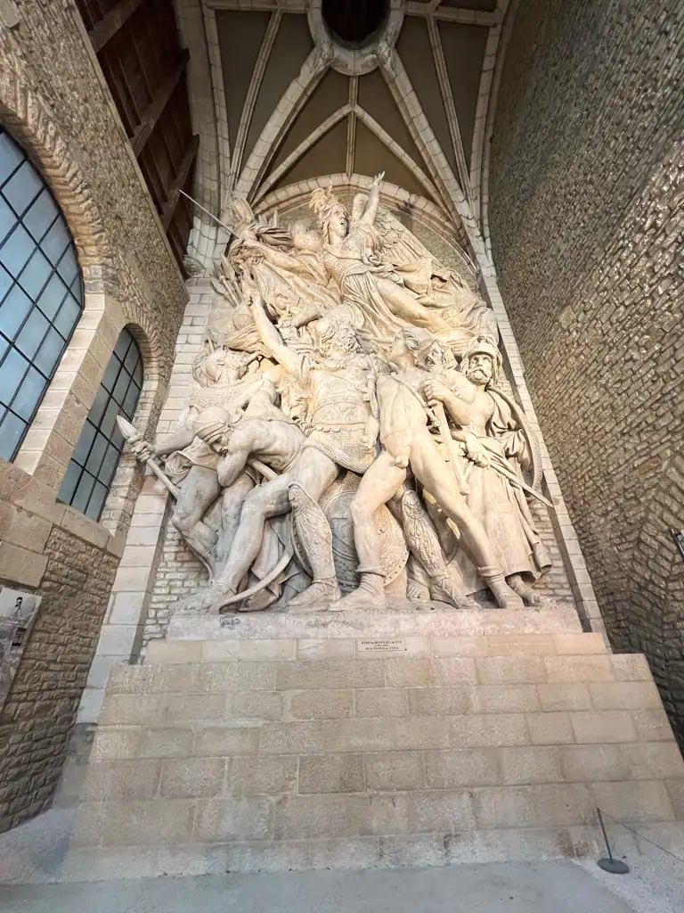 A large statue in a museum on Dijon's owl trail. 
