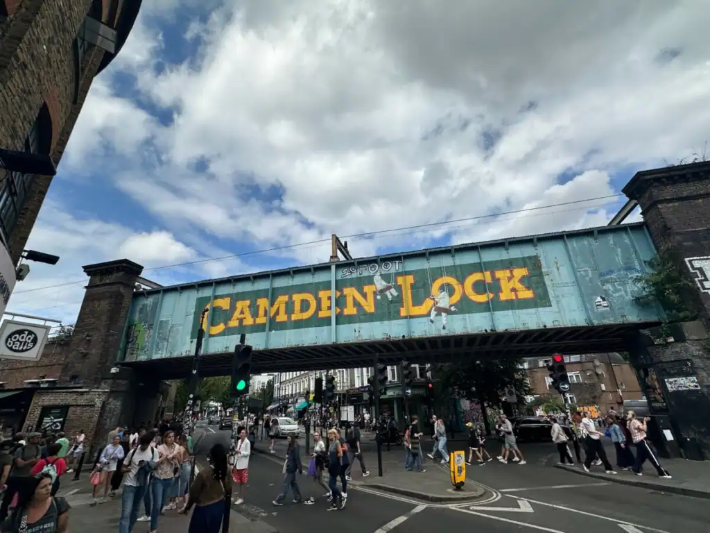 A large bridge/sign for the camden lock the best place to stay in london.