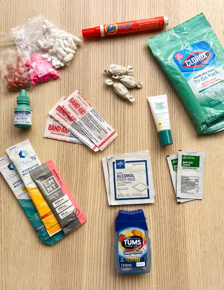A table full of medical products for a traveling medical kit.
