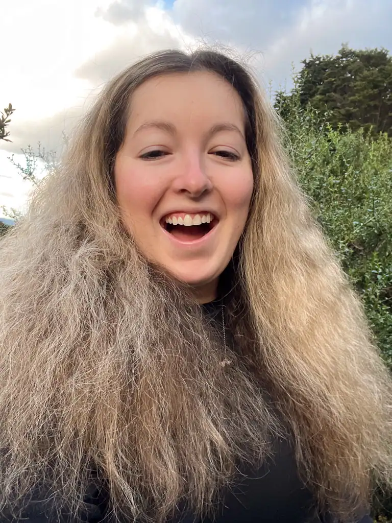 girl with very frizzy hair on the patagonia w-trek 