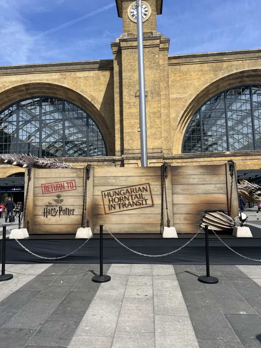 View of Kings cross with a harry potter box with a dragon in it the best place to stay in london. 