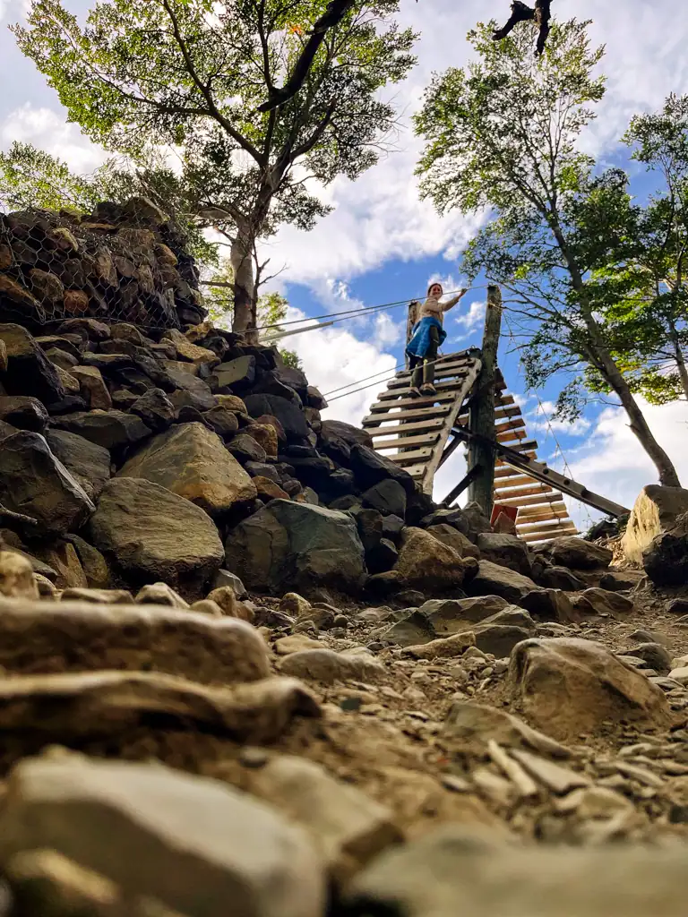 Crossing a suspension bridge in Chilean Patagonia on the W-trek. 