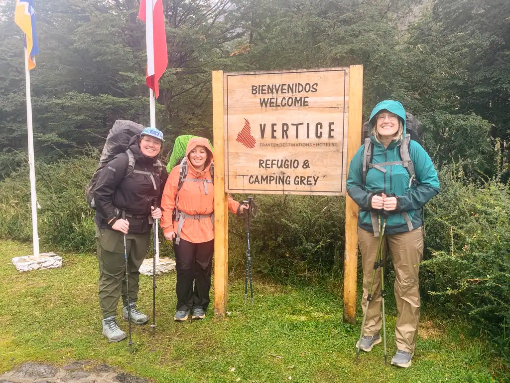 Hikers stand outside of Grey Glacier refugio on day 2 of the w trek. 