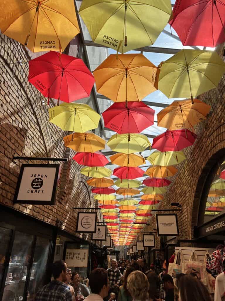 An umbrella lined ceiling in Camden Market the best place to stay in london.