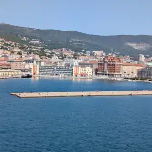 a view of Trieste, Italy looking over the water and the city.