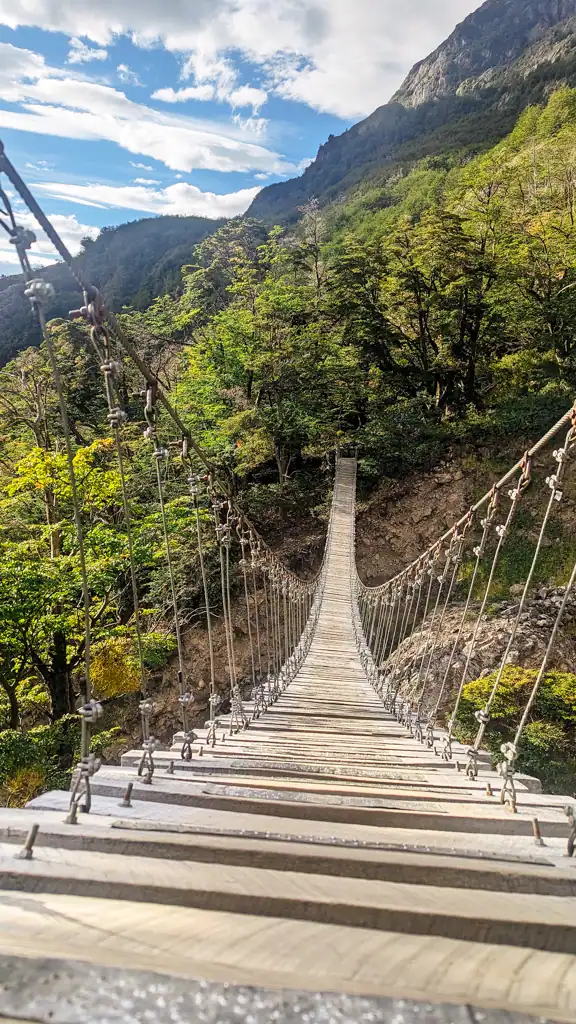 a long suspension bridge in Patagonia day 1 on the W-trek
