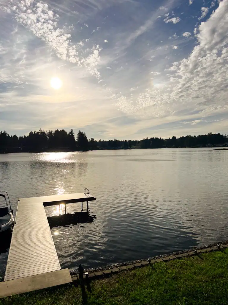 The sun overlooking a dock at Ladies reading weekend. 