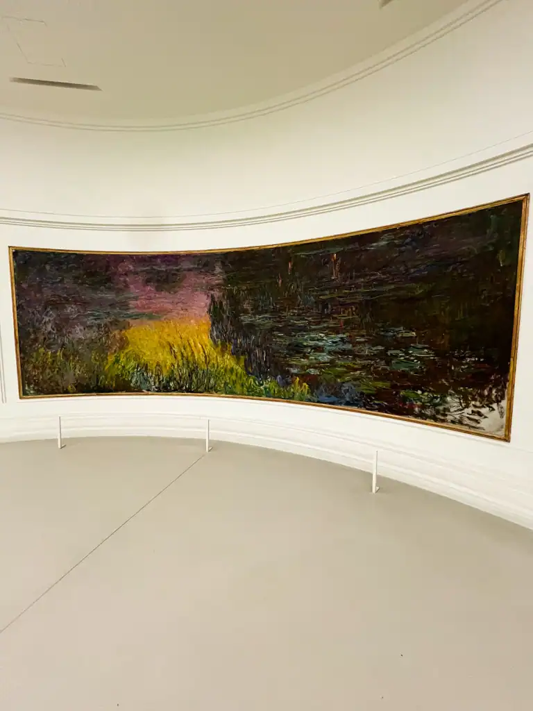 A monet piece at the Musee de l'orangerie on a Paris spring day. 