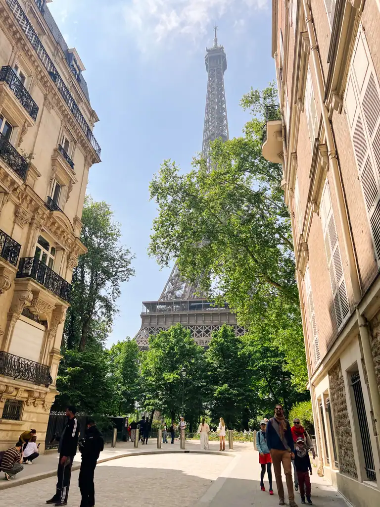 The eiffel tower view from rue de l'universite. 