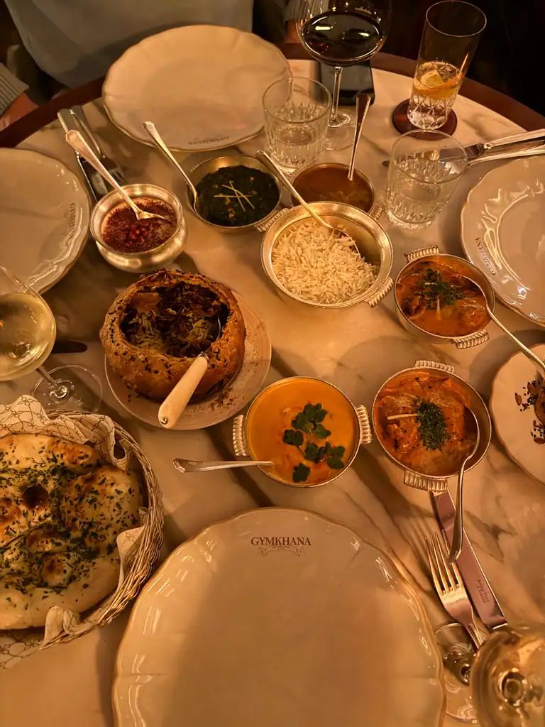 A table full of Indian dishes at Gymkhana.