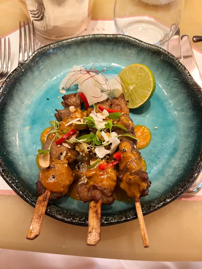 3 chicken satay skewers at the ivey in London on a perfect solo day in london.