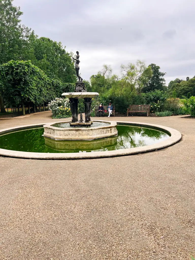 a statue and fountain in hyde park in London. 