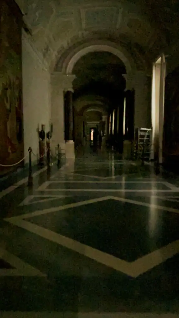 A dark hallway before the lights turn on at the Vatican Museum. 