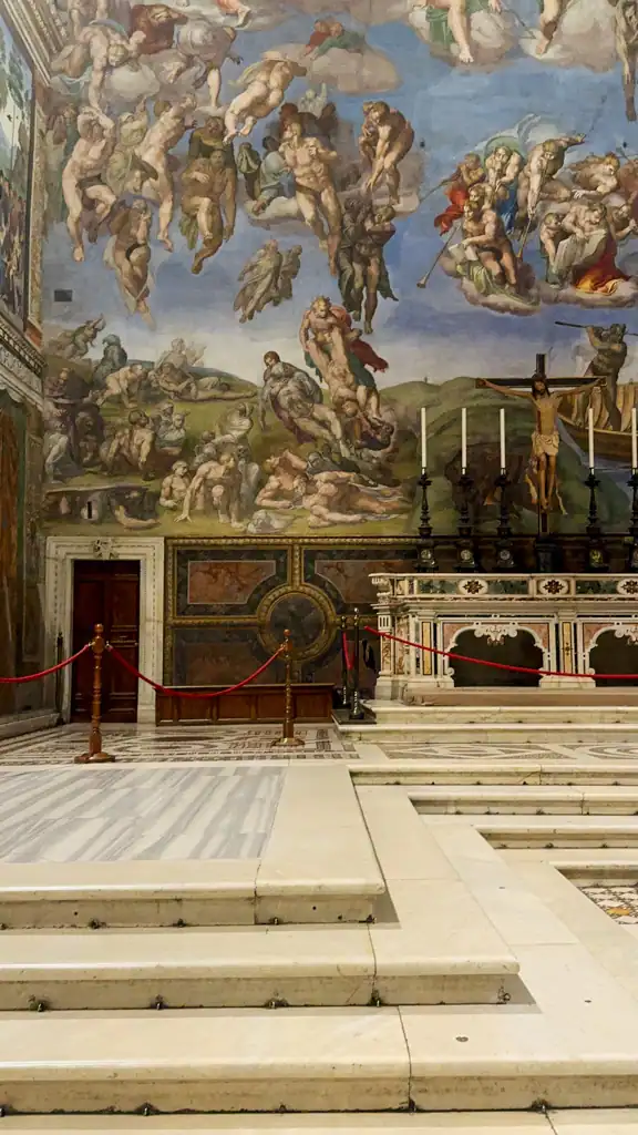 A glimpse of the Last Judgement in the Sistine Chapel in the Vatican Museum on the keymaster tour 