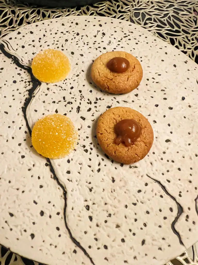 two small cookies and two small gummies from Az-Zait in Seville. 