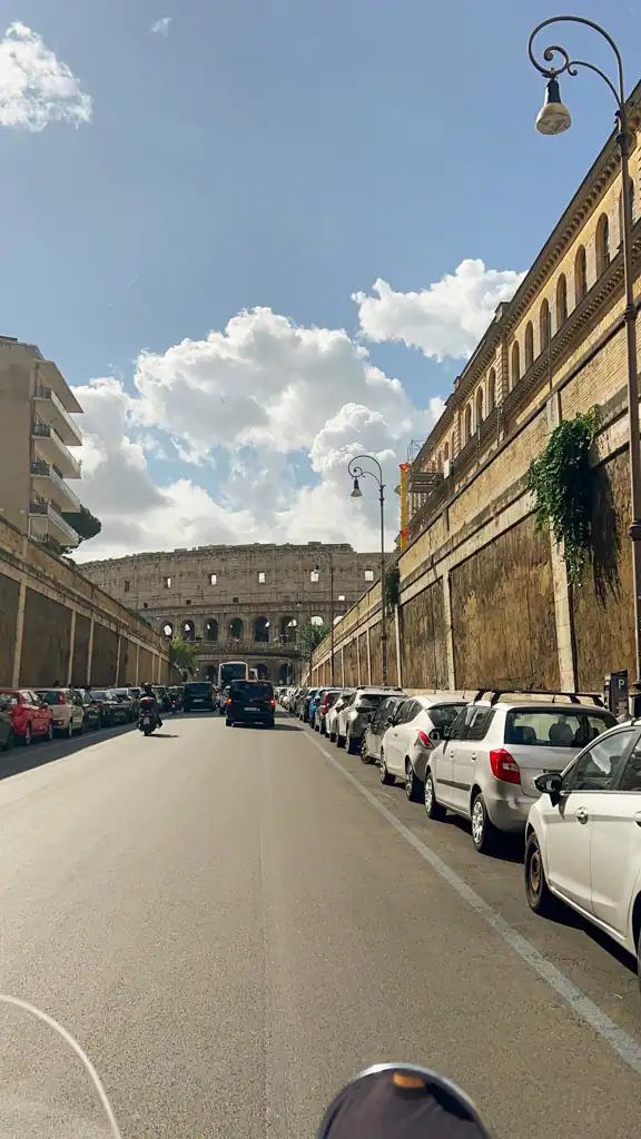 A view of the colosseum in Rome from the Monti neighborhood. 