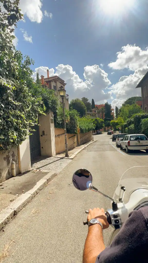 View from the back of the vespa, down a neighborhood street in Testaccio. 