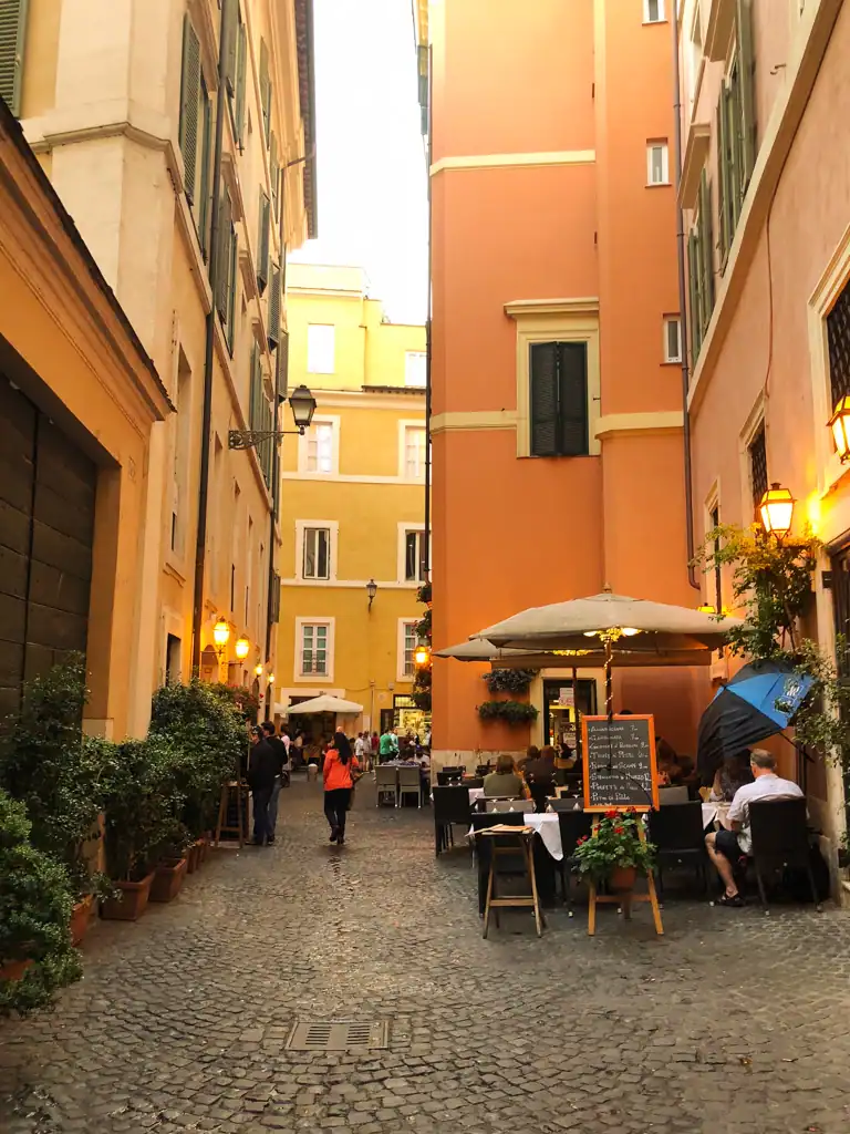 A neighborhood street in Rome's historic center neighborhood, one of the best to stay in Rome. 