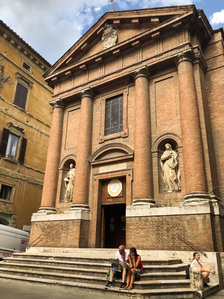 The oldest bank in Italy with Roman columns and statues located in Siena in Tuscany. 