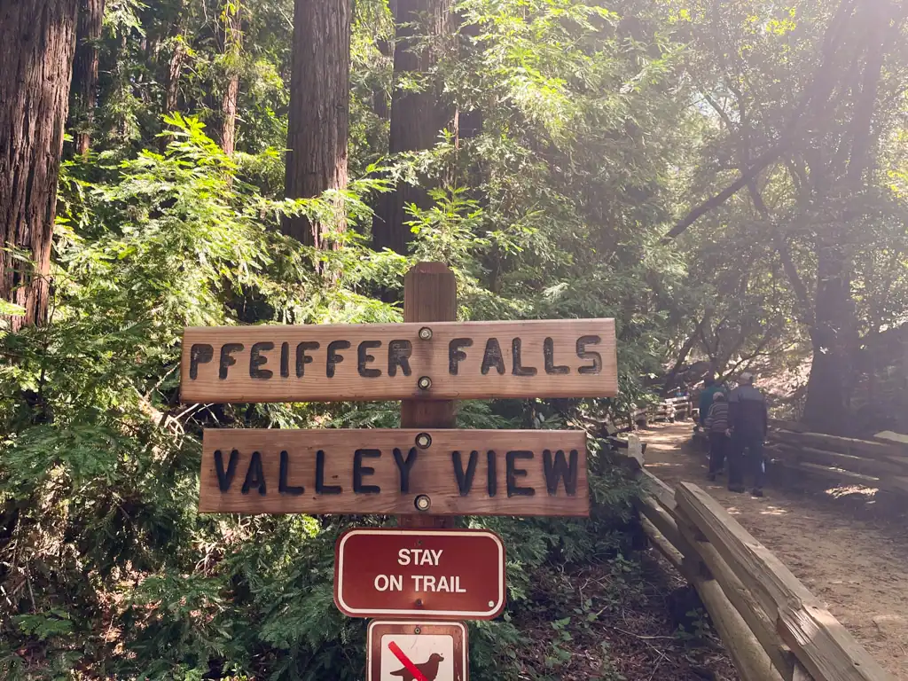 A sign for pfeiffer falls and valley view in this big sur guide. 