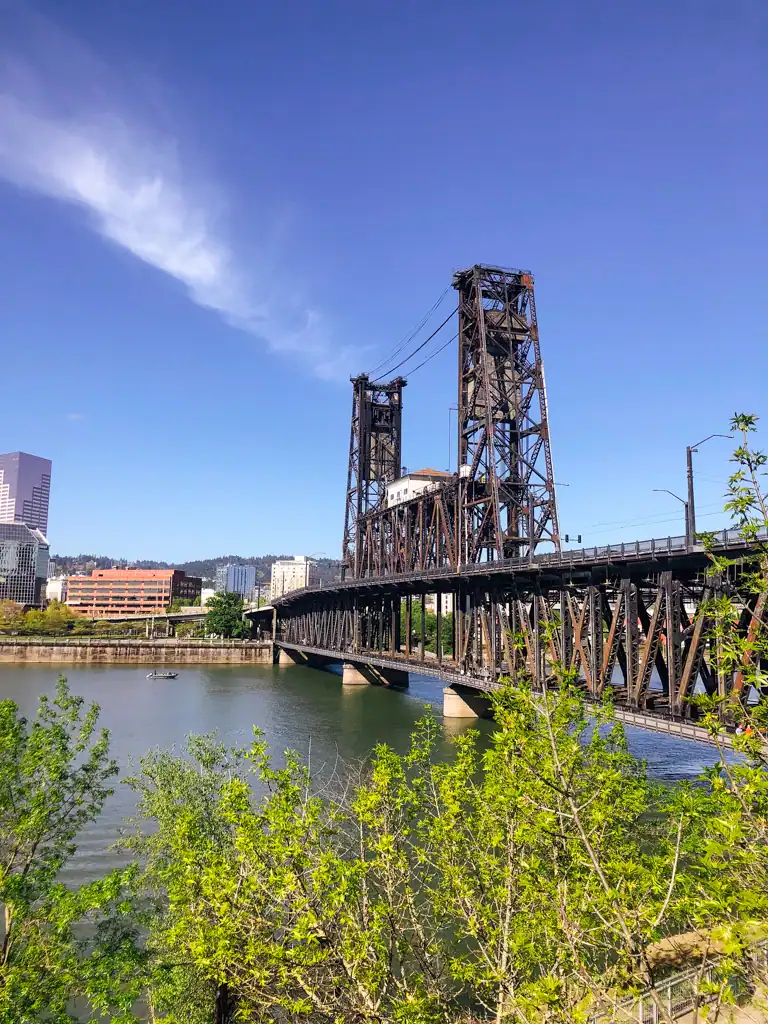 An angled view of the two towers of the steel bridge in Portland. 