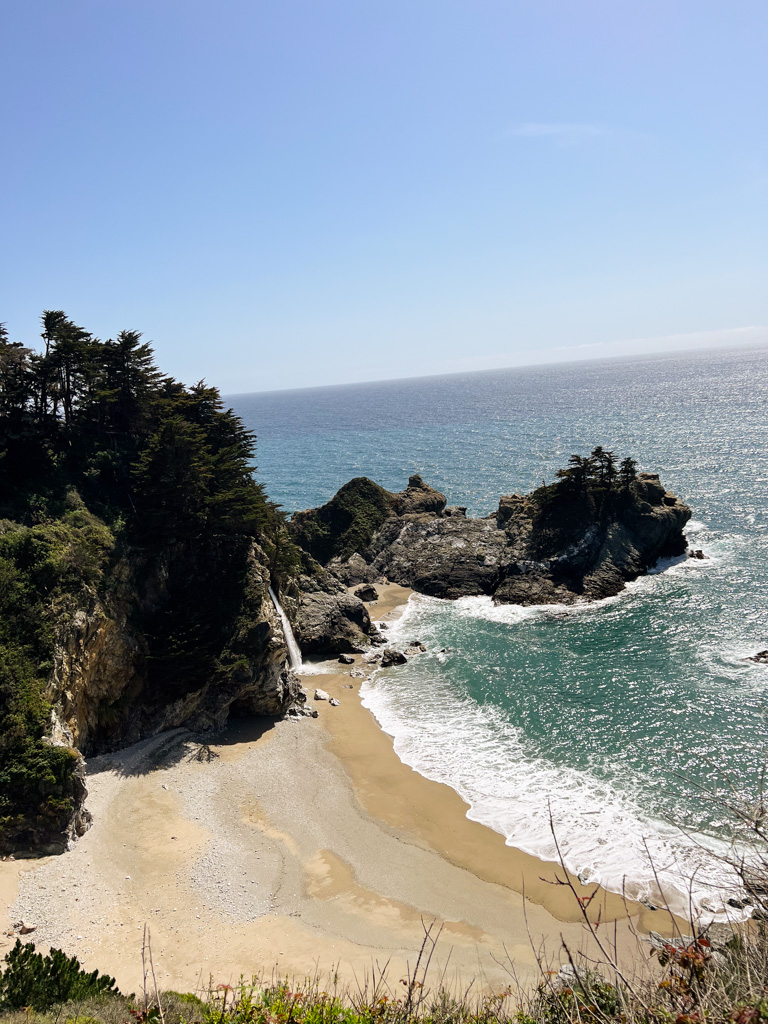 the ocean and mcelway falls with its rocks and trees on this big sur guide. 