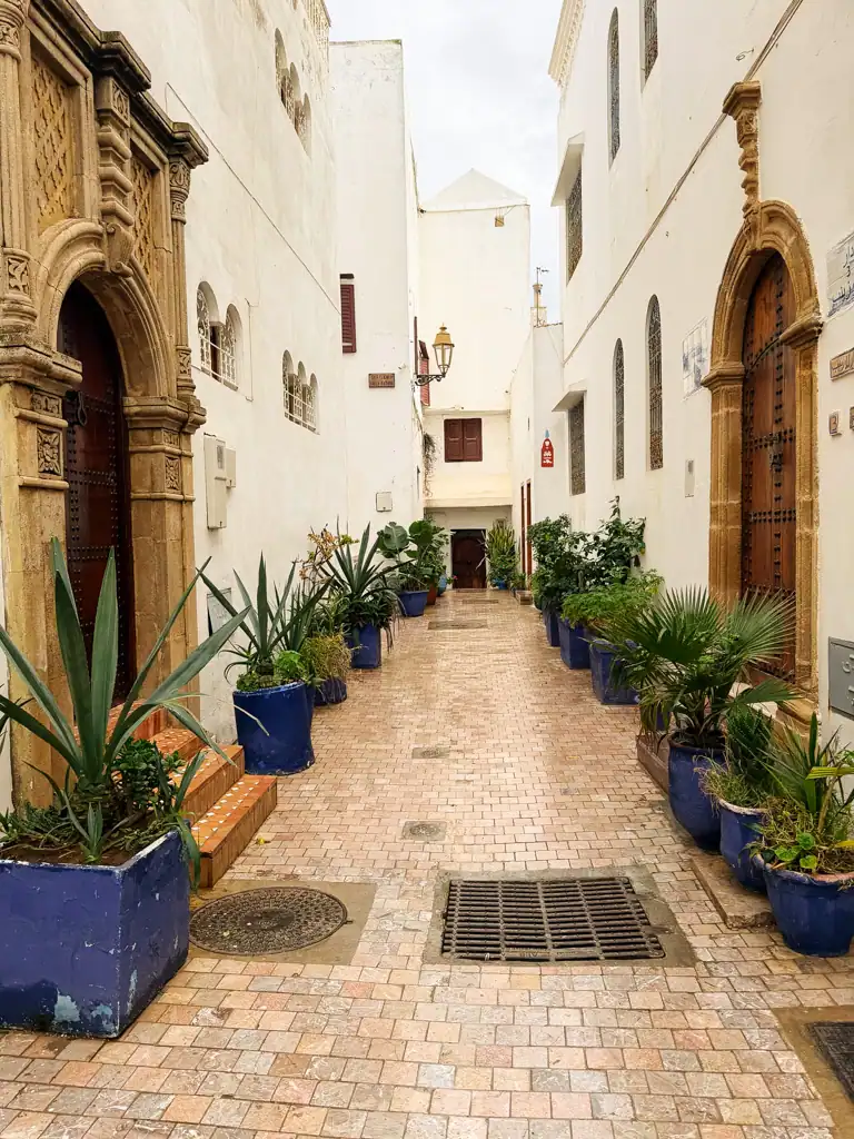 A white building lined street in the Kasbah in Rabat. 