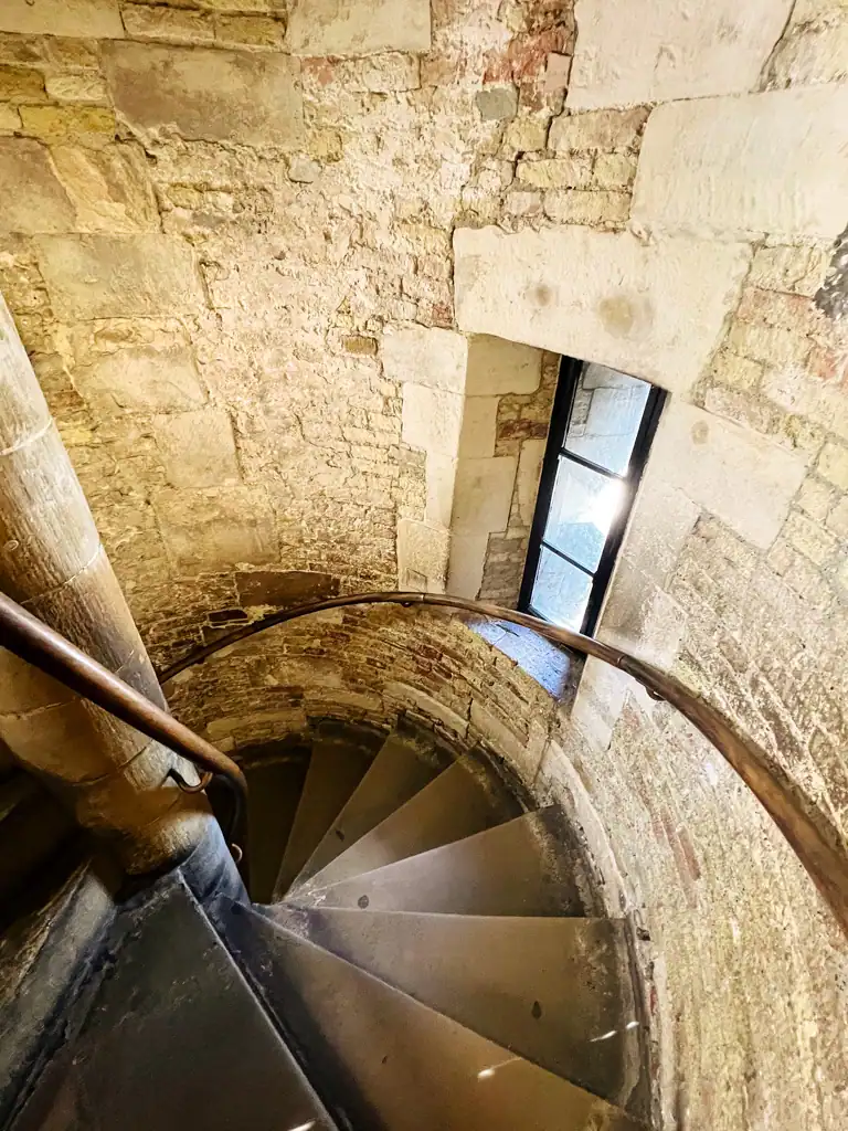 a spiral stairwell at the tower of london. 