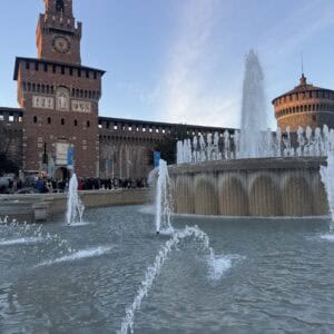 a fountain outside of the fortress in Milan.