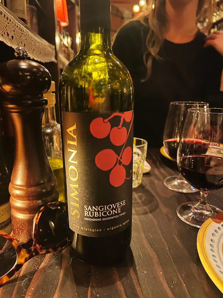 A bottle of red wine at Carmelo a big mamma restaurant in lyon.