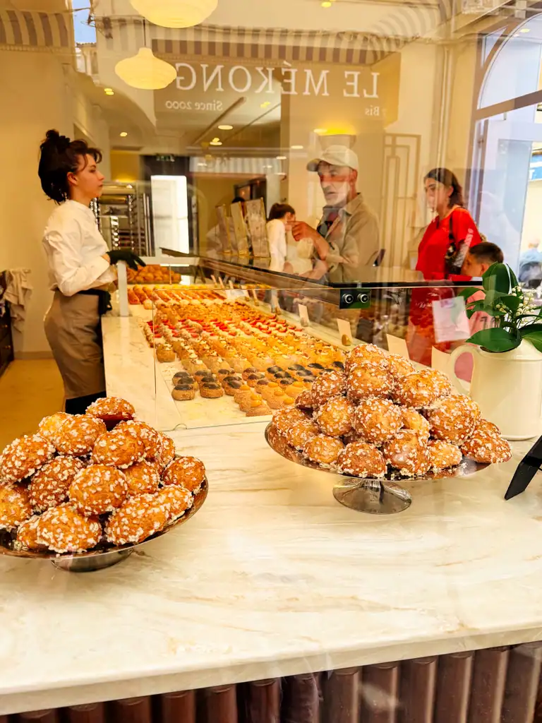 Le mekong patisserie shop in aix-en-provence with rows and rows of choux pastry. 