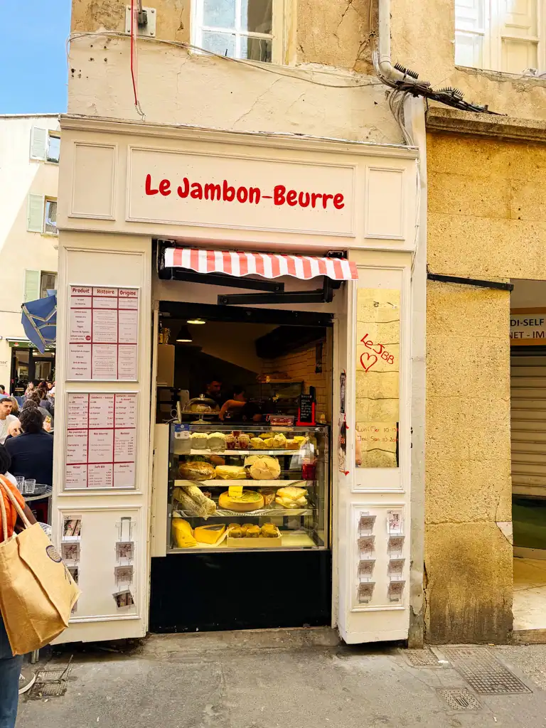 the small sandwich shop with red lettering that says le jambon-beurre. 